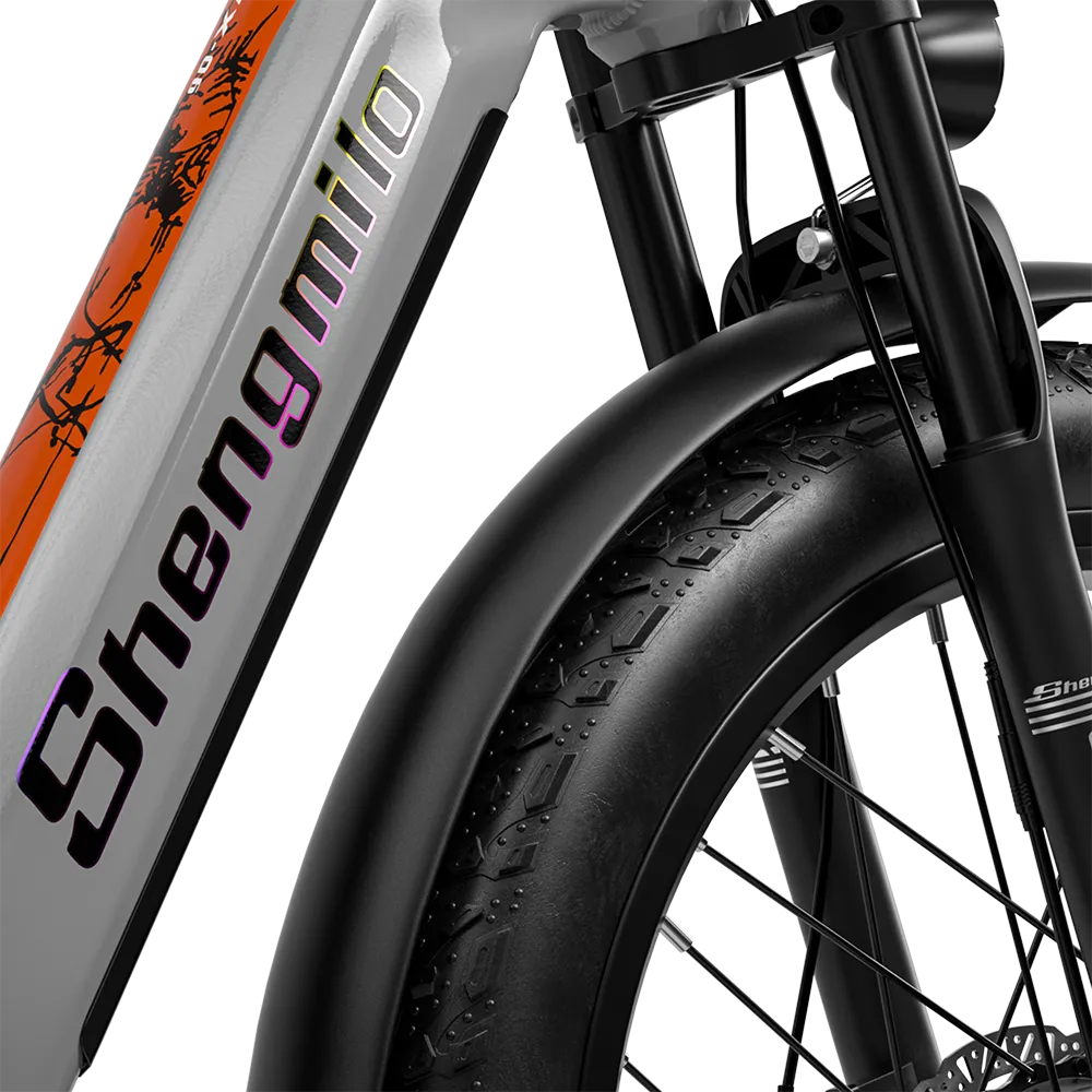 Close-up view of the single front fork suspension on the Shengmilo MX06PRO Electric Bike, highlighting its sturdy design and advanced shock-absorbing capabilities for a smooth ride on rough trails.
