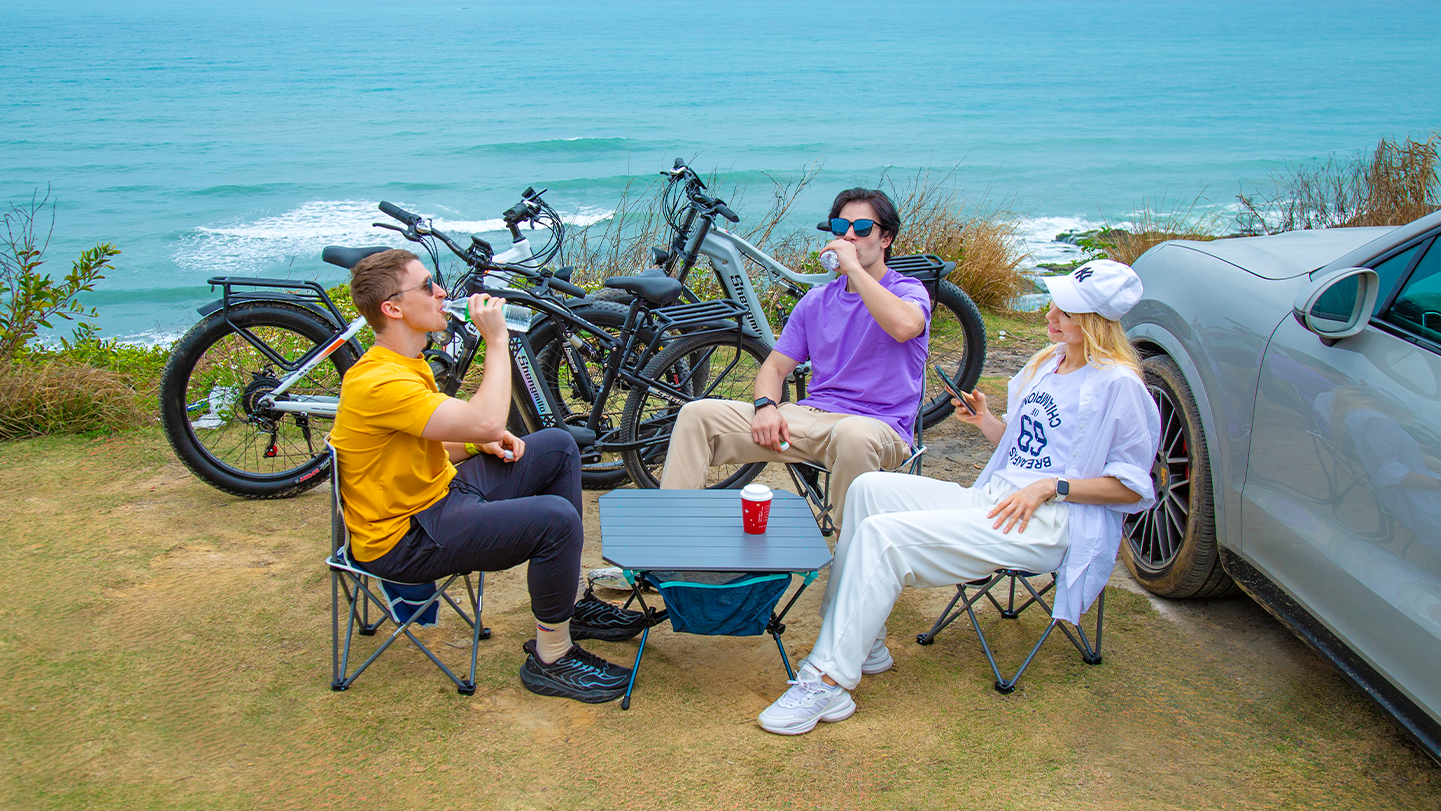 The pictures show enjoying the ride with the Shengmilo E-Bike outdoors.