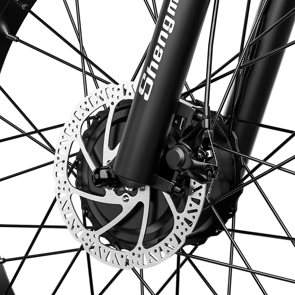 Close-up of the front brake on Shengmilo S600 e-bike, providing reliable stopping power for safe riding on Australian trails and rugged terrain