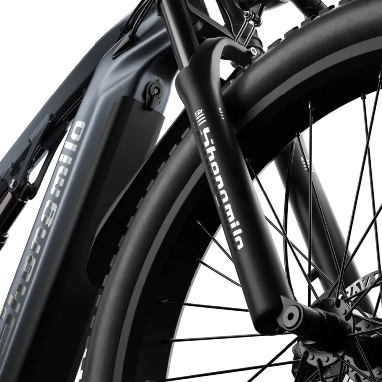 Close-up of the front fork on Shengmilo MX05 e-bike, designed with suspension to absorb shocks and provide a smoother ride on Australian trails and city roads